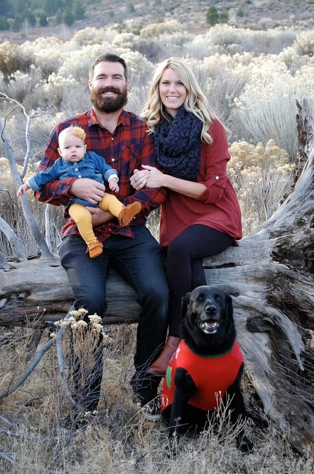 Josh Paulson with his family and dog in the high desert